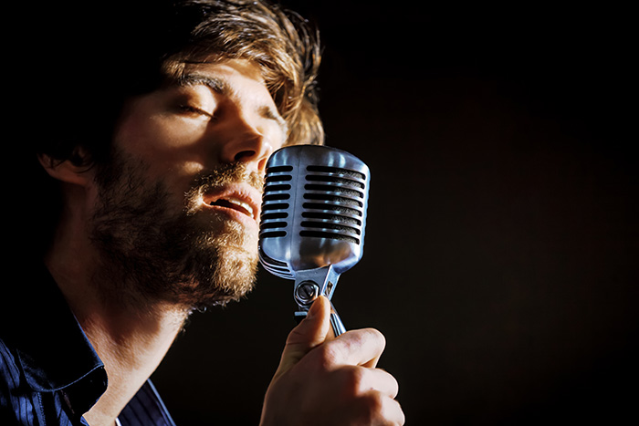 A man singing soulfully