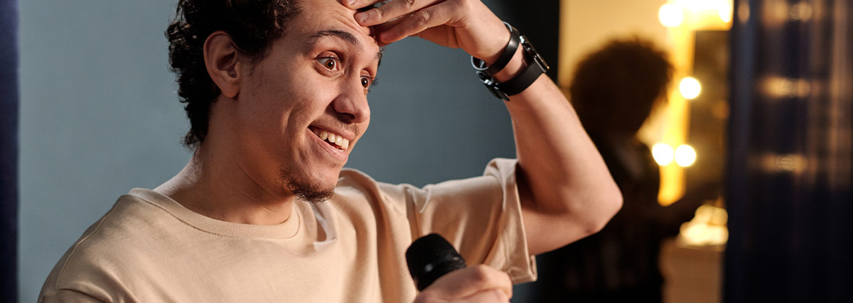 Adult singer looks having struggle while practising