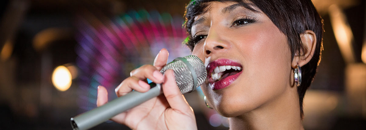 Adult singing student performing with developed vocal skills
