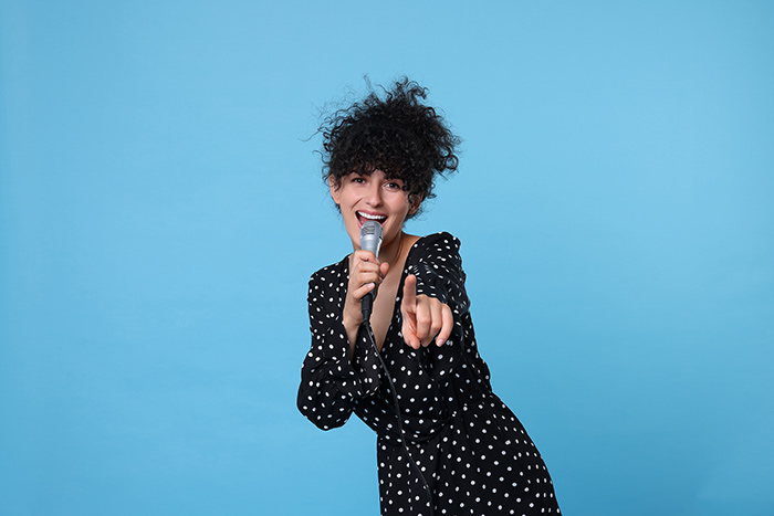 Beautiful woman singing feat