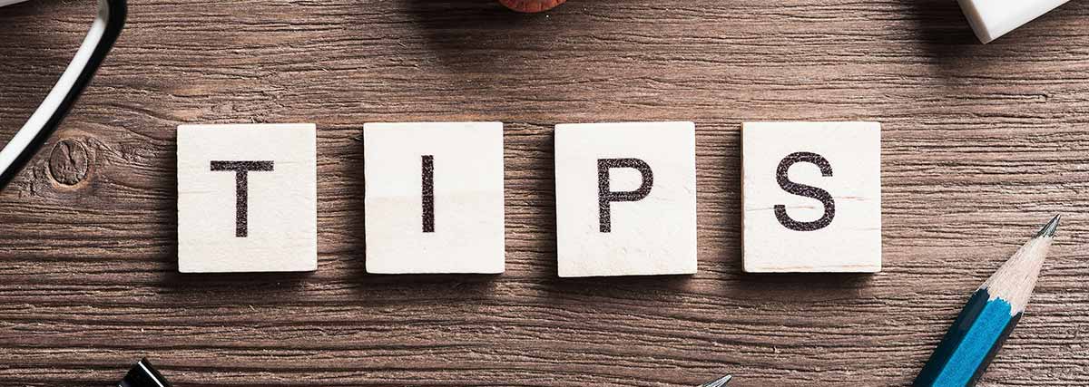 Blocks depicting tips word and pencil
