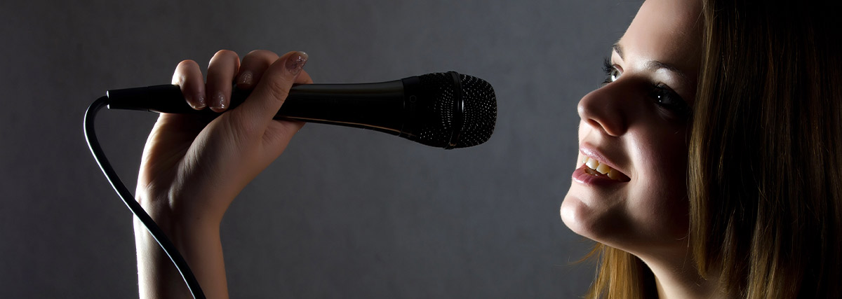 Lady holding a microphone