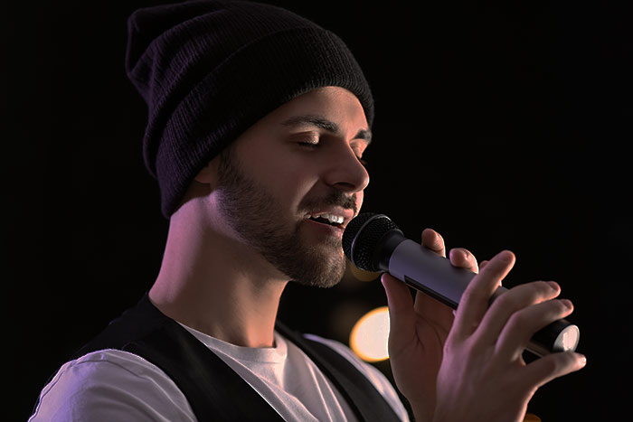 male singer performing feat