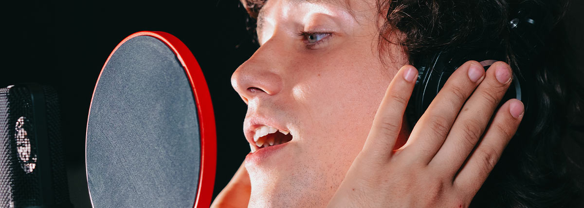 Man singing in studio