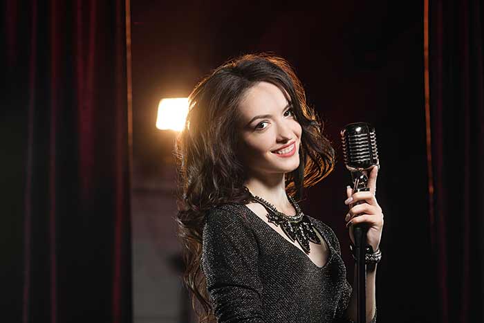 professional singer on stage feat
