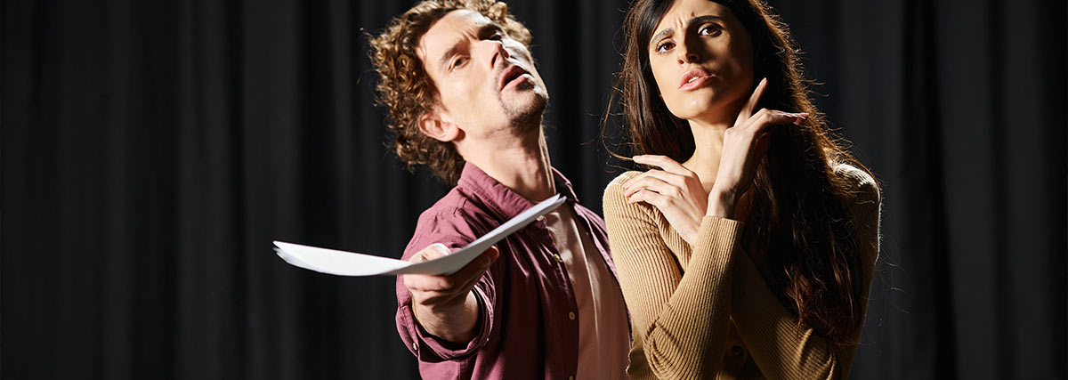 Two music theater singers rehearsing