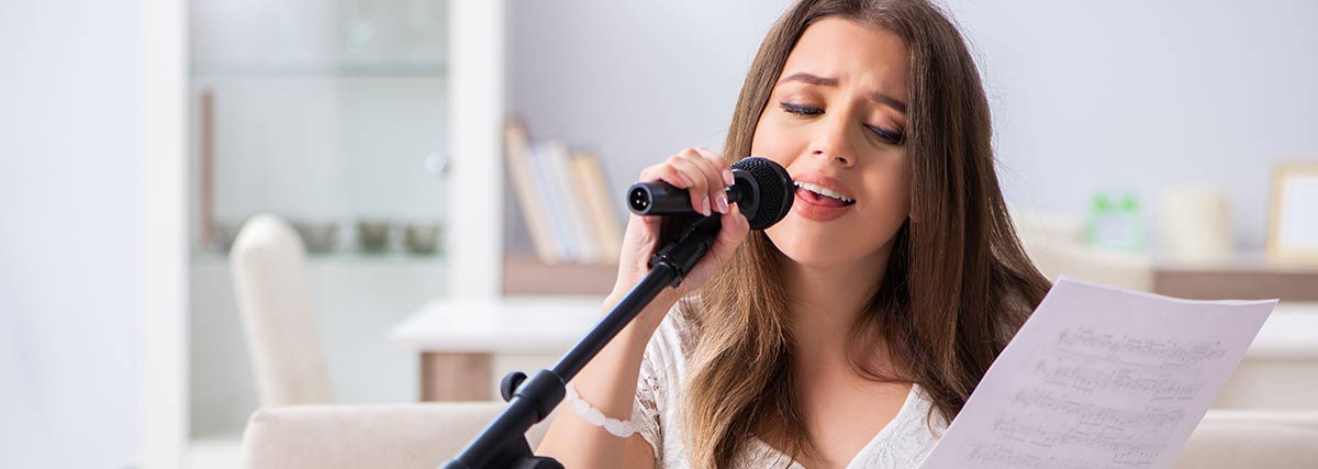 woman singing at home