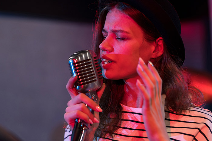 Woman singing passionately