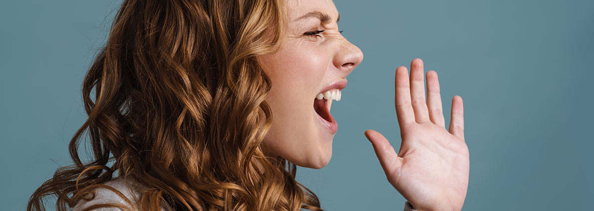Woman with curl hair shouting