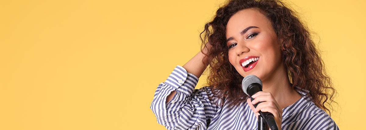 Woman with curl hair singing