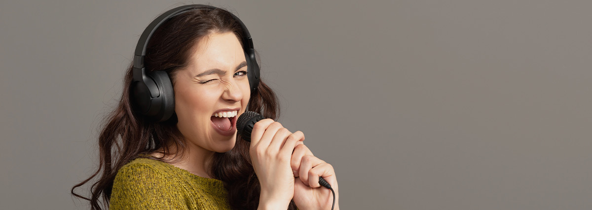 Woman with headphone singing